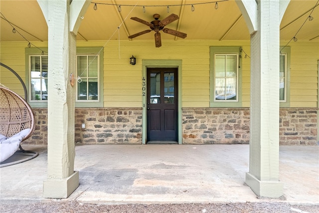 650 Dekalb St Unit 4302, Auburn, AL 38630 - view of exterior entry with stone siding, covered porch, and ceiling fan