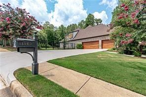 exterior space with a front lawn