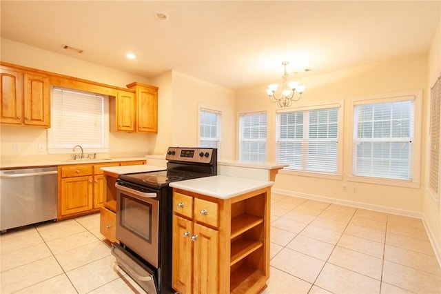 kitchen featuring range with electric cooktop, sink, decorative light fixtures, an inviting chandelier, and dishwasher