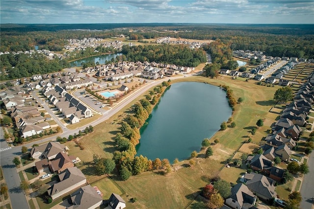 197 Westover St, Auburn, AL 36832 - aerial view of property and surrounding area with nearby suburban area, a nearby body of water, and a heavily wooded area
