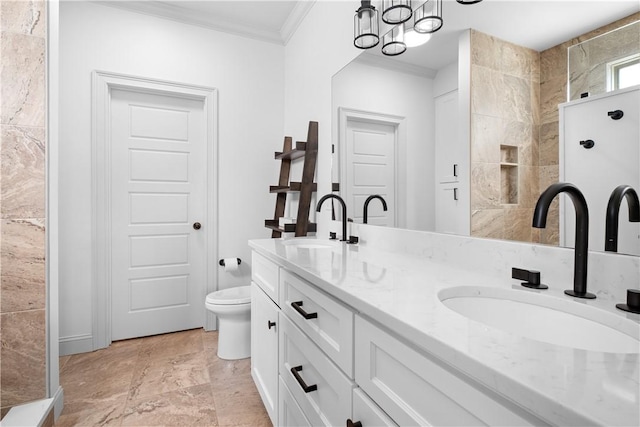 197 Westover St, Auburn, AL 36832 - bathroom featuring ornamental molding, double vanity, and toilet