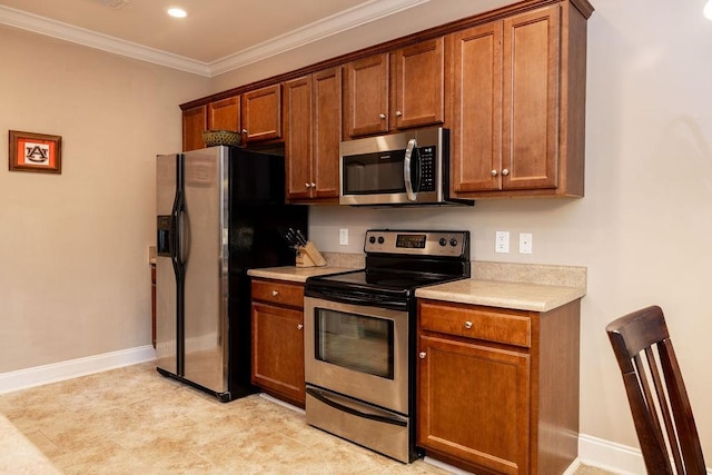 1986 Stephanie Ct Unit Lt64, Auburn, AL 36830 - kitchen with appliances with stainless steel finishes, light countertops, crown molding, brown cabinets, and recessed lighting