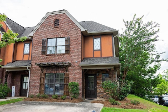 1986 Stephanie Ct Unit Lt64, Auburn, AL 36830 - view of front of home with brick siding and roof with shingles