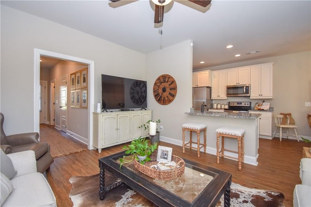 2046 Stephanie Ct, Auburn, AL 36830 - living room featuring wood finished floors, ceiling fan, recessed lighting, and baseboards
