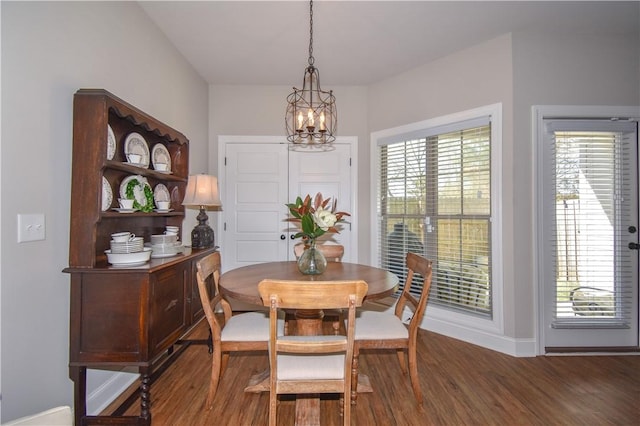2046 Stephanie Ct, Auburn, AL 36830 - dining space with a chandelier, wood finished floors, and baseboards