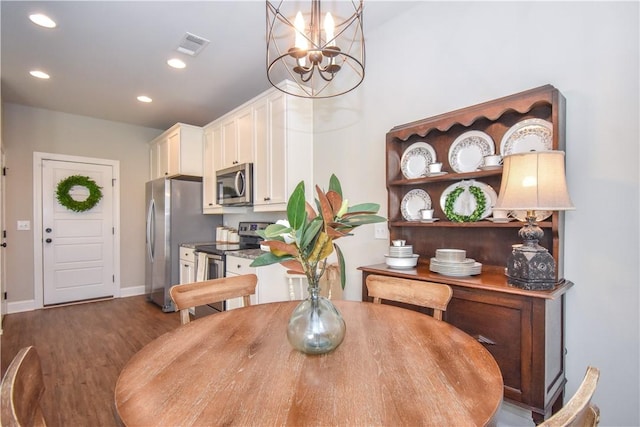 2046 Stephanie Ct, Auburn, AL 36830 - dining room featuring wood finished floors, a chandelier, recessed lighting, and baseboards