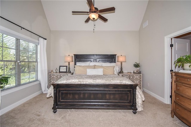 2046 Stephanie Ct, Auburn, AL 36830 - bedroom featuring vaulted ceiling, multiple windows, light carpet, and baseboards