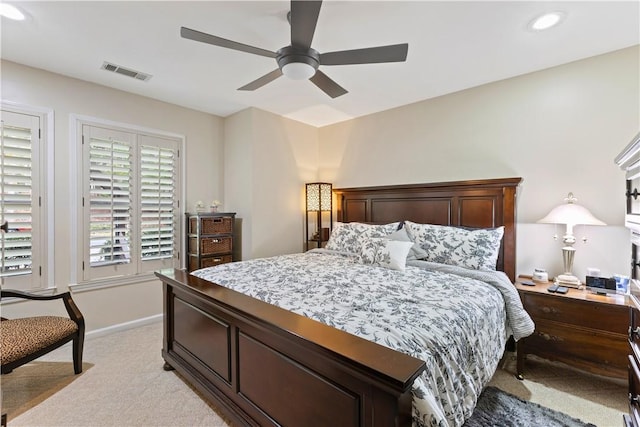 carpeted bedroom with ceiling fan