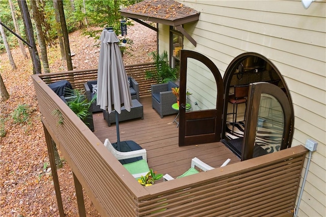 deck with an outdoor hangout area