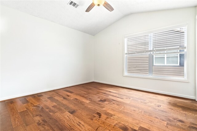 1114 S College St Unit 302, Auburn, AL 36830 - unfurnished room with vaulted ceiling, a ceiling fan, wood finished floors, baseboards, and visible vents