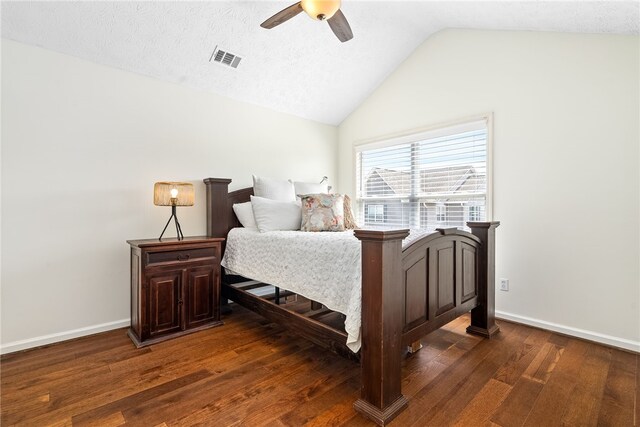 1114 S College St Unit 302, Auburn, AL 36830 - bedroom featuring baseboards, wood finished floors, visible vents, and vaulted ceiling