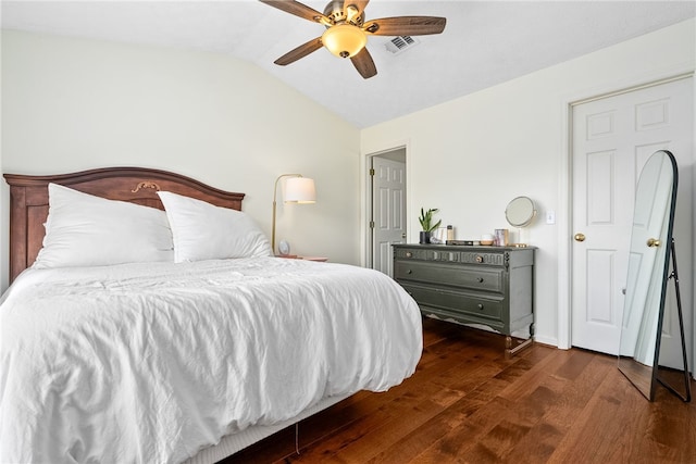 1114 S College St Unit 302, Auburn, AL 36830 - bedroom featuring vaulted ceiling, visible vents, dark wood-type flooring, and a ceiling fan