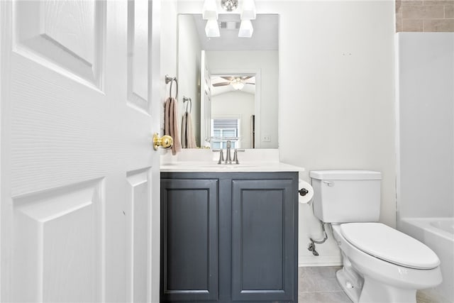 1114 S College St Unit 302, Auburn, AL 36830 - bathroom featuring tile patterned flooring, toilet, vanity, and a ceiling fan