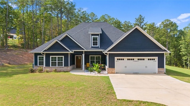 craftsman-style home with a garage and a front yard