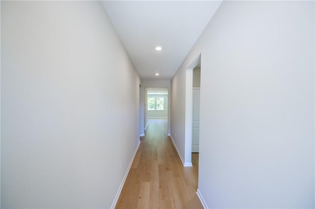 hallway with light wood-type flooring