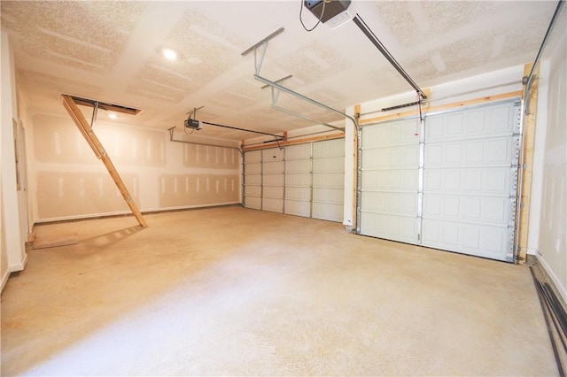 garage featuring a garage door opener