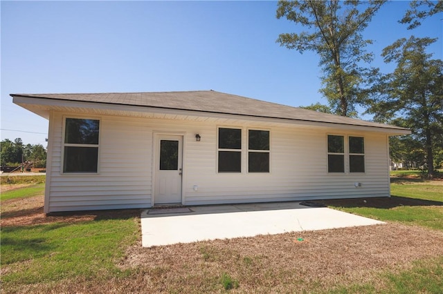 rear view of house featuring a patio area