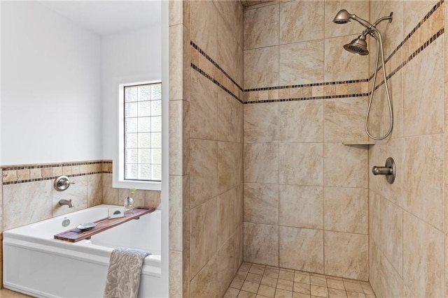 full bath featuring a stall shower and a bath