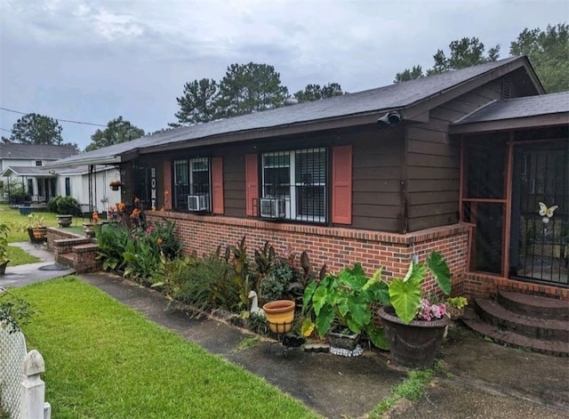 2102 Susie Cir, Tuskegee, AL 36083 - view of side of property featuring brick siding