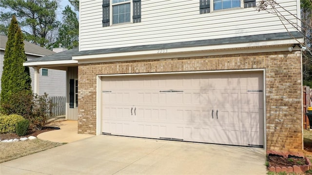 garage with driveway