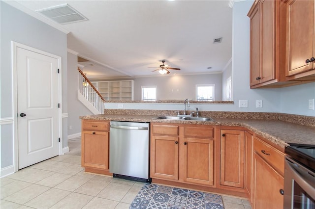 kitchen featuring a sink, visible vents, stainless steel dishwasher, and light tile patterned floors