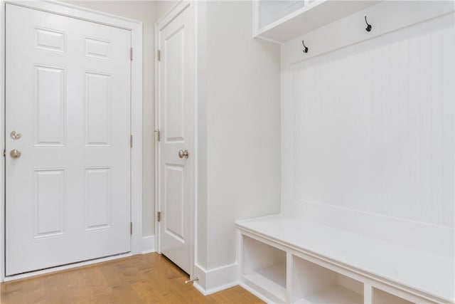 mudroom with light hardwood / wood-style floors