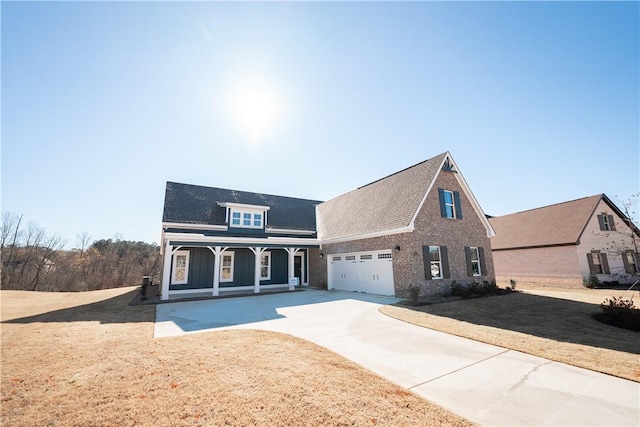 view of front of house featuring covered porch and a front lawn