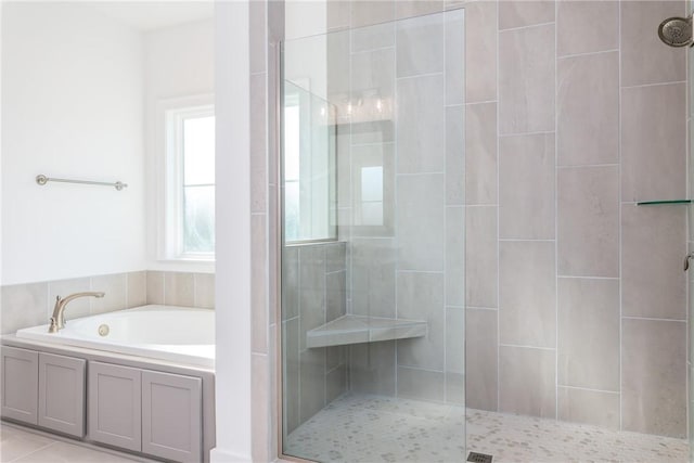 1534 Everly Dr, Opelika, AL 36801 - bathroom with a shower stall and a bath