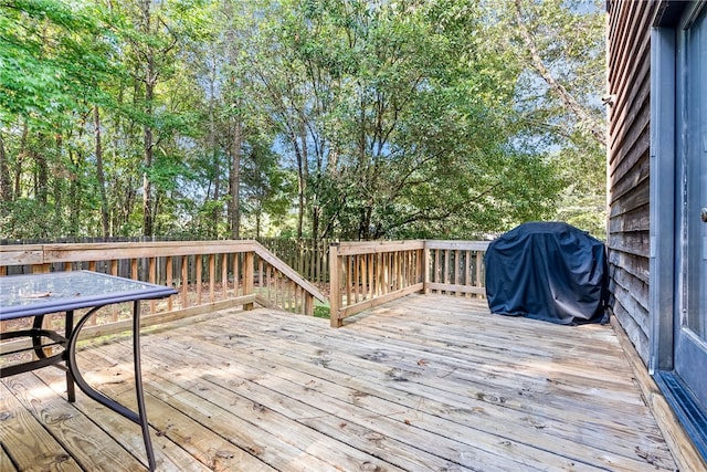 wooden deck featuring grilling area