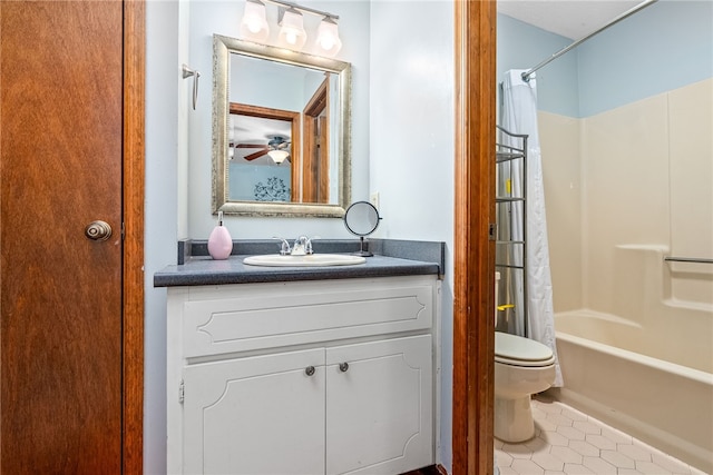 full bathroom featuring vanity, tile patterned flooring, ceiling fan, toilet, and shower / bathtub combination with curtain