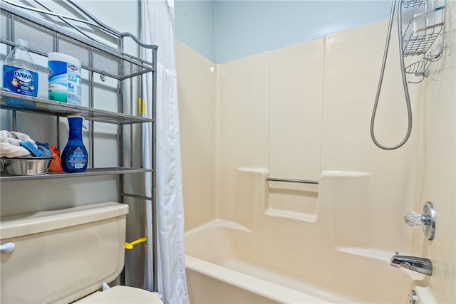 bathroom featuring toilet and shower / tub combo with curtain