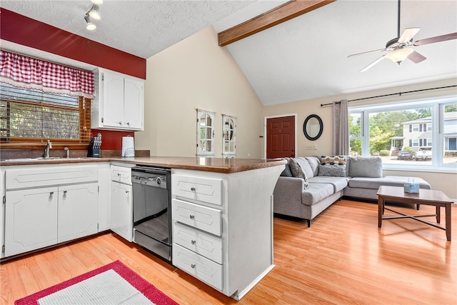 kitchen featuring white cabinetry, dishwasher, sink, kitchen peninsula, and a textured ceiling