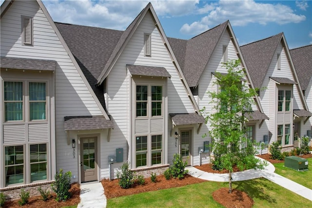 305 Northgate Blvd, Auburn, AL 36830 - view of front of house with a shingled roof and a front yard
