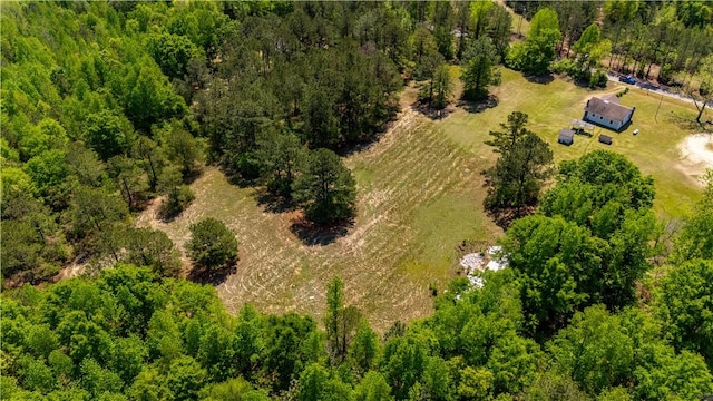 bird's eye view featuring a view of trees