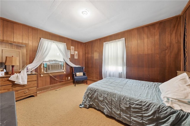 carpeted bedroom with wooden walls and cooling unit