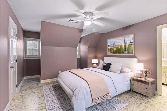 bedroom featuring visible vents, baseboards, ensuite bath, and ceiling fan