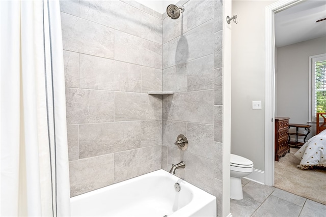 1843 Yarbrough Farms Blvd, Auburn, AL 36830 - bathroom with toilet, bathing tub / shower combination, ensuite bathroom, tile patterned flooring, and baseboards