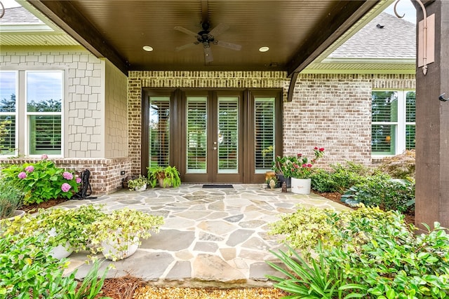1843 Yarbrough Farms Blvd, Auburn, AL 36830 - property entrance with brick siding, ceiling fan, and a patio