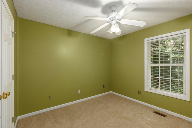 2428 E University Dr Unit 904, Auburn, AL 36830 - empty room with light carpet, baseboards, and a ceiling fan