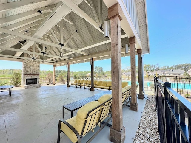 520 Cloverdale Dr, Auburn, AL 38630 - view of patio with an outdoor stone fireplace, a gazebo, fence, and a ceiling fan