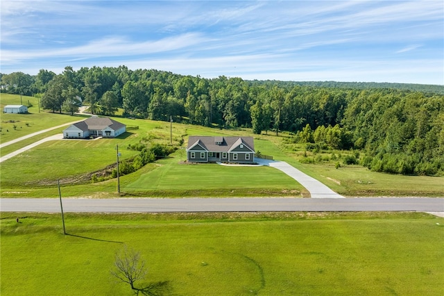 drone / aerial view with a view of trees