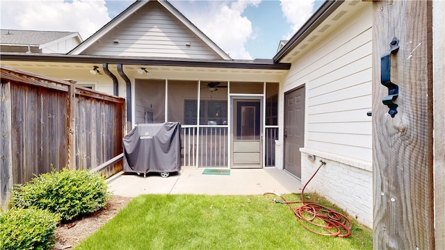 574 Grey Oak Cir, Auburn, AL 36830 - view of exterior entry featuring a patio area and ceiling fan