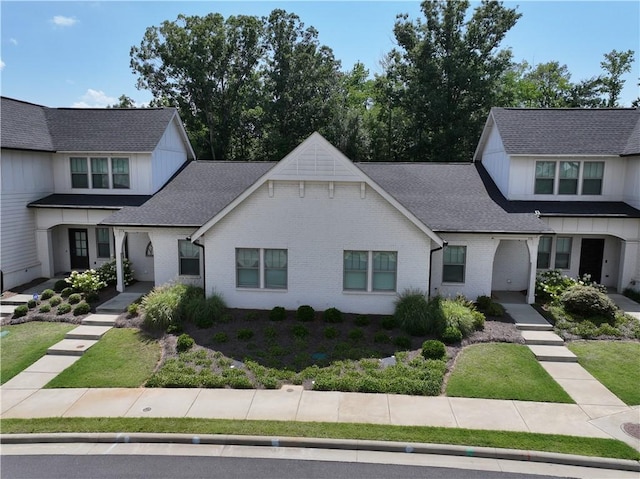 574 Grey Oak Cir, Auburn, AL 36830 - view of front of house featuring a shingled roof and brick siding