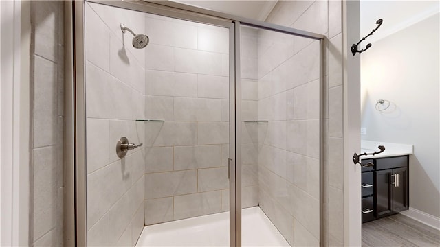 574 Grey Oak Cir, Auburn, AL 36830 - full bathroom with a stall shower, vanity, and wood finished floors