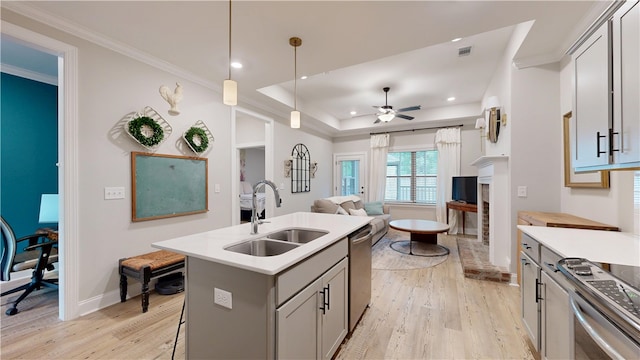 574 Grey Oak Cir, Auburn, AL 36830 - kitchen featuring stainless steel appliances, light wood-type flooring, open floor plan, a ceiling fan, and recessed lighting