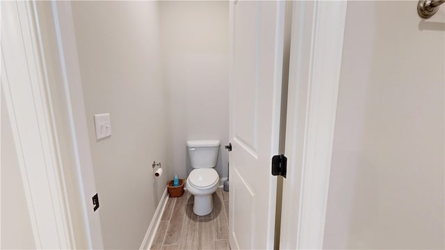 574 Grey Oak Cir, Auburn, AL 36830 - bathroom featuring toilet and baseboards