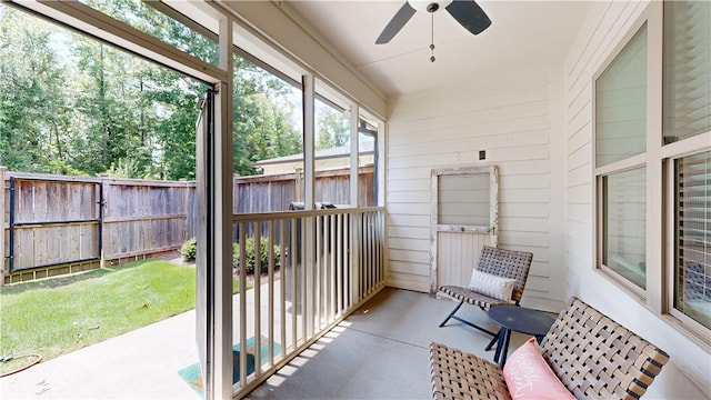 574 Grey Oak Cir, Auburn, AL 36830 - unfurnished sunroom featuring ceiling fan