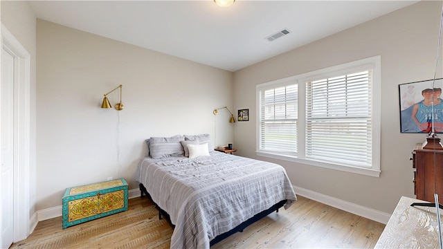 574 Grey Oak Cir, Auburn, AL 36830 - bedroom with wood finished floors and baseboards