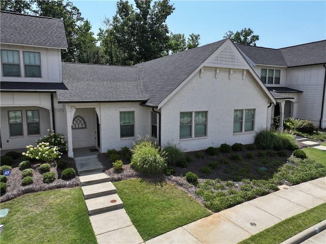 574 Grey Oak Cir, Auburn, AL 36830 - view of front of home featuring brick siding, a shingled roof, and a front yard
