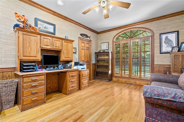 home office featuring ceiling fan, light hardwood / wood-style floors, and ornamental molding